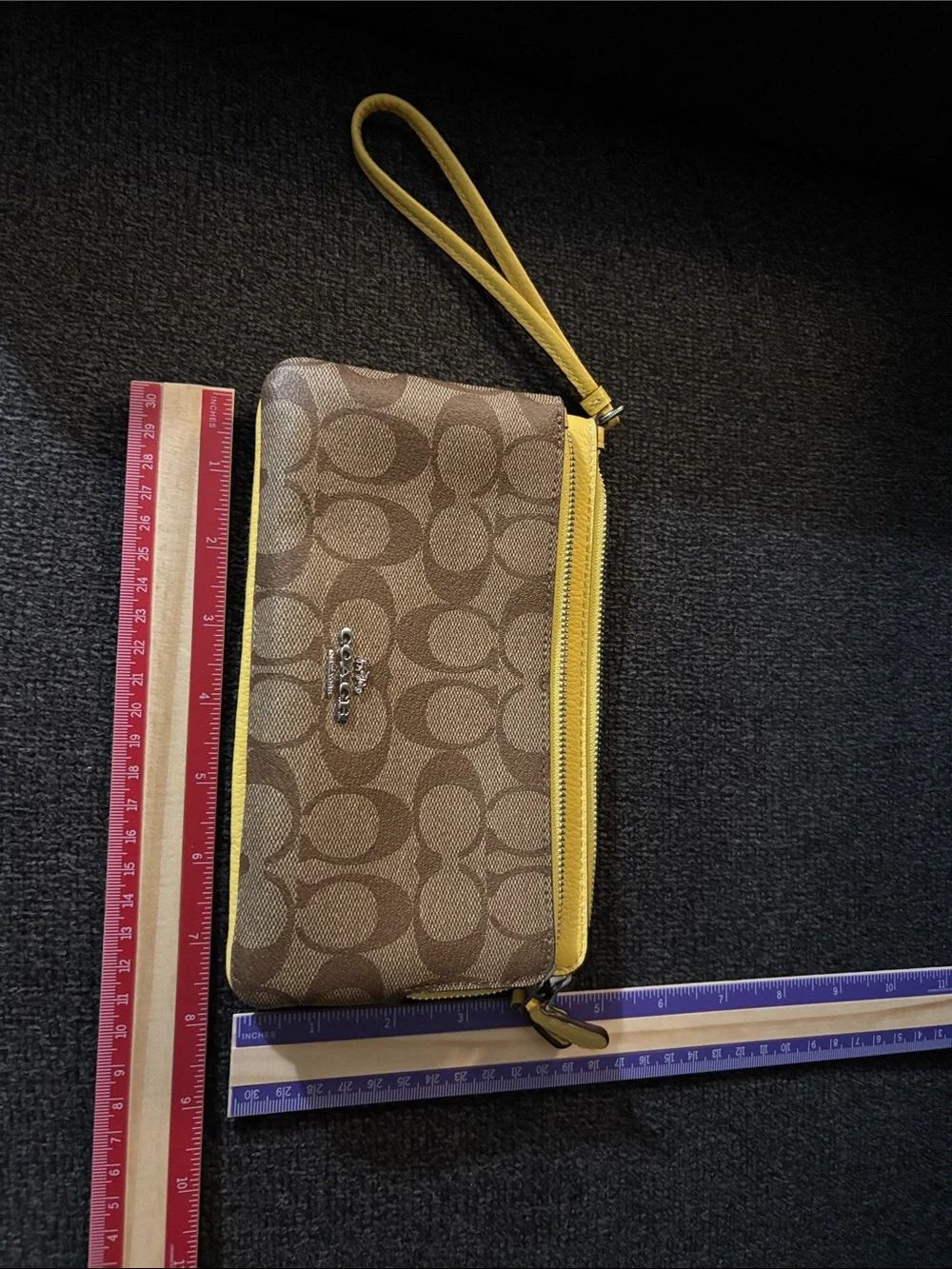 Coach Brown Signature Canvas Wristlet with Yellow Trim. New with tag. Never used
